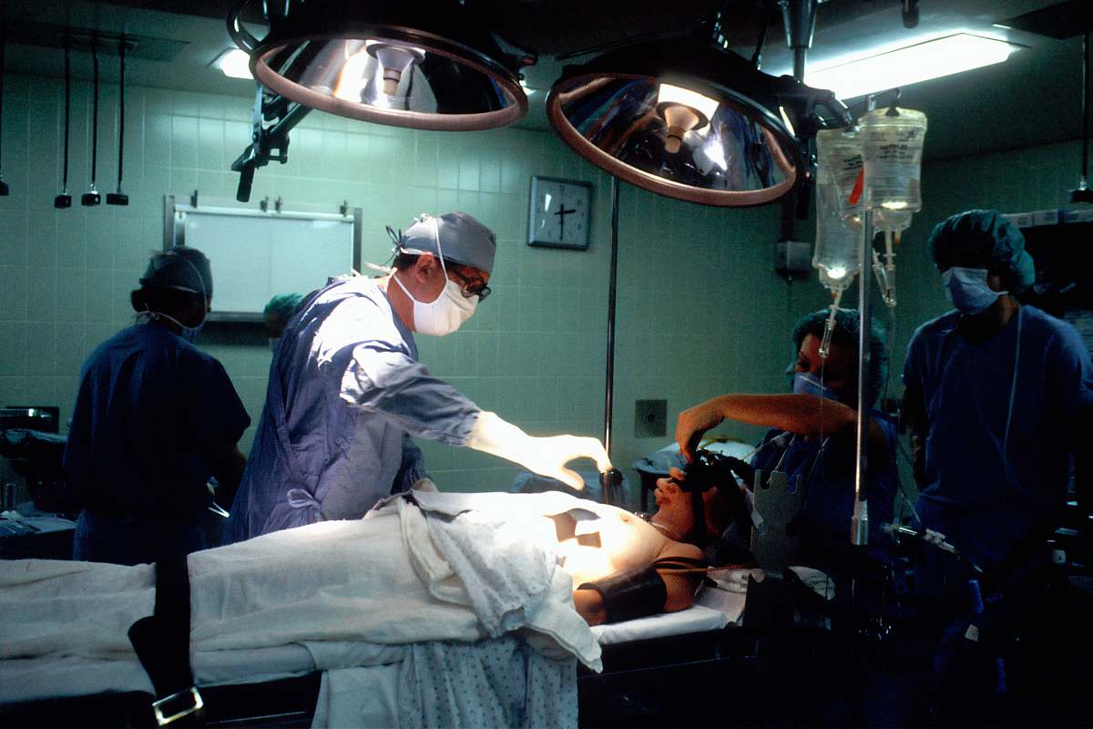 operating theatre doctor and nurses inside operating room clinic